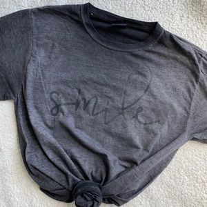 Vintage wash style Tee “smile” size Small